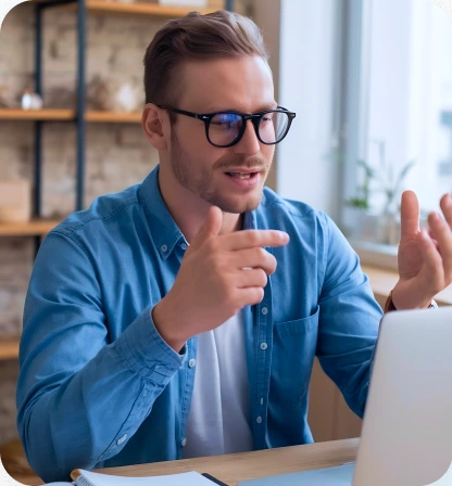 A tutor talking with a learner on a video call